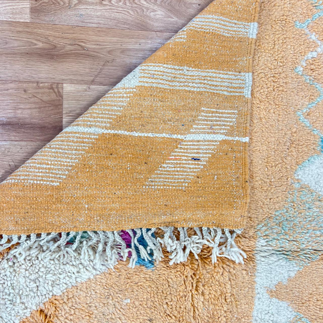 Vintage Moroccan wool rug 813 – handwoven Berber carpet featuring orange, red, turquoise and cream abstract patterns, 264 × 148 cm (8.66 × 4.85 ft).