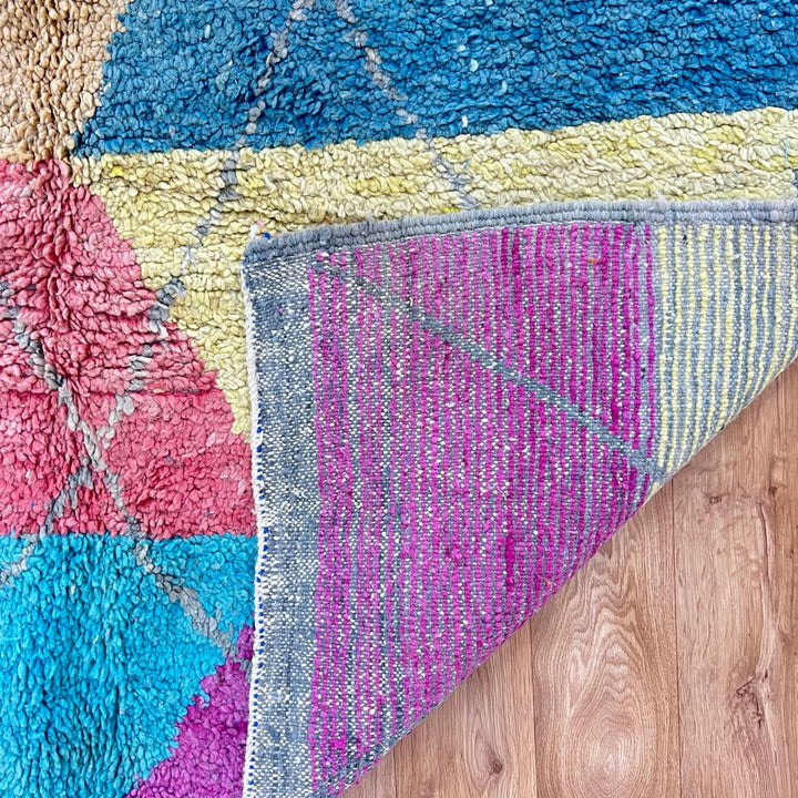 Vintage Moroccan wool rug 755 – handmade colorful geometric Berber carpet with fuchsia, orange, teal, and yellow tones, 252 × 166 cm (8.26 × 5.44 ft).