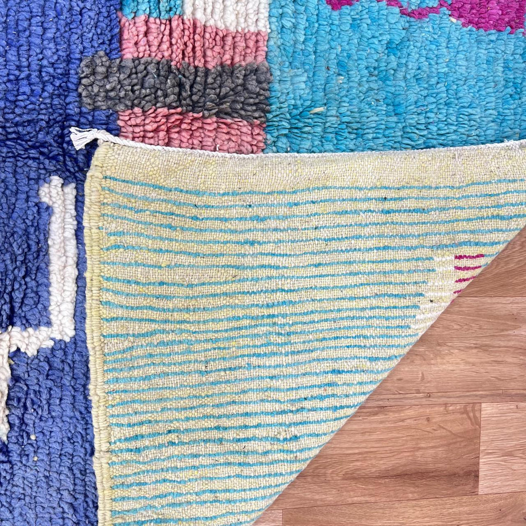 Vintage Moroccan wool rug 794 – handmade blue and multicolor Berber carpet with abstract tribal motifs 256 × 151 cm (8.39 × 4.95 ft).