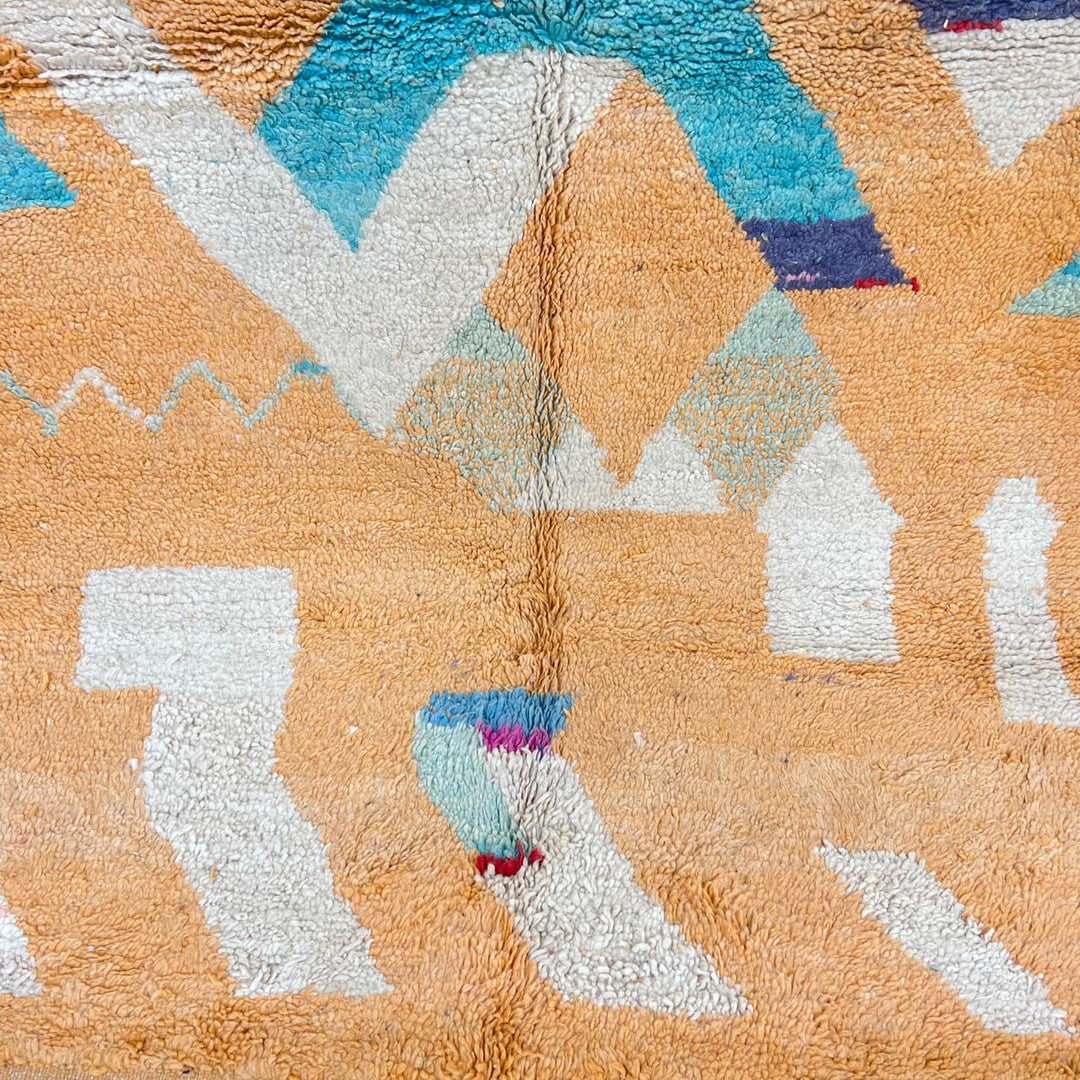 Vintage Moroccan wool rug 813 – handwoven Berber carpet featuring orange, red, turquoise and cream abstract patterns, 264 × 148 cm (8.66 × 4.85 ft).