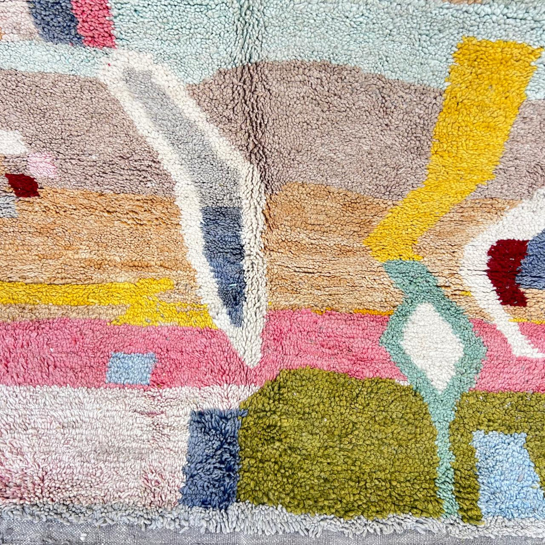 Vintage Moroccan wool rug 761 – handmade colorful Berber carpet with geometric abstract design in pink, turquoise, mustard, and beige tones, 260 × 151 cm.