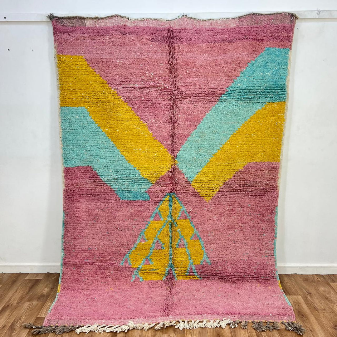 Vintage Moroccan wool rug 779 – handmade pink and yellow geometric Berber carpet with turquoise details, 325 × 167 cm (10.66 × 5.47 ft).