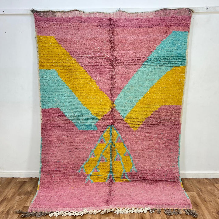 Vintage Moroccan wool rug 779 – handmade pink and yellow geometric Berber carpet with turquoise details, 325 × 167 cm (10.66 × 5.47 ft).