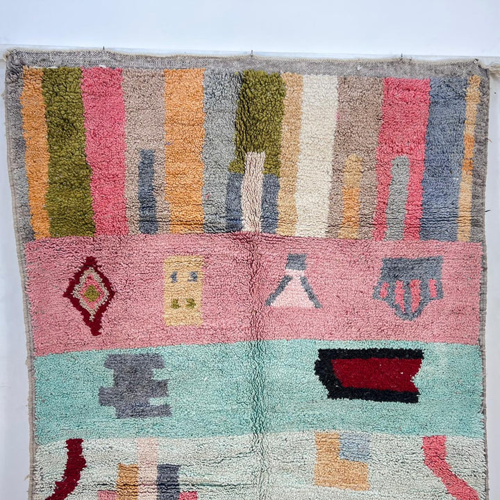 Vintage Moroccan wool rug 761 – handmade colorful Berber carpet with geometric abstract design in pink, turquoise, mustard, and beige tones, 260 × 151 cm.