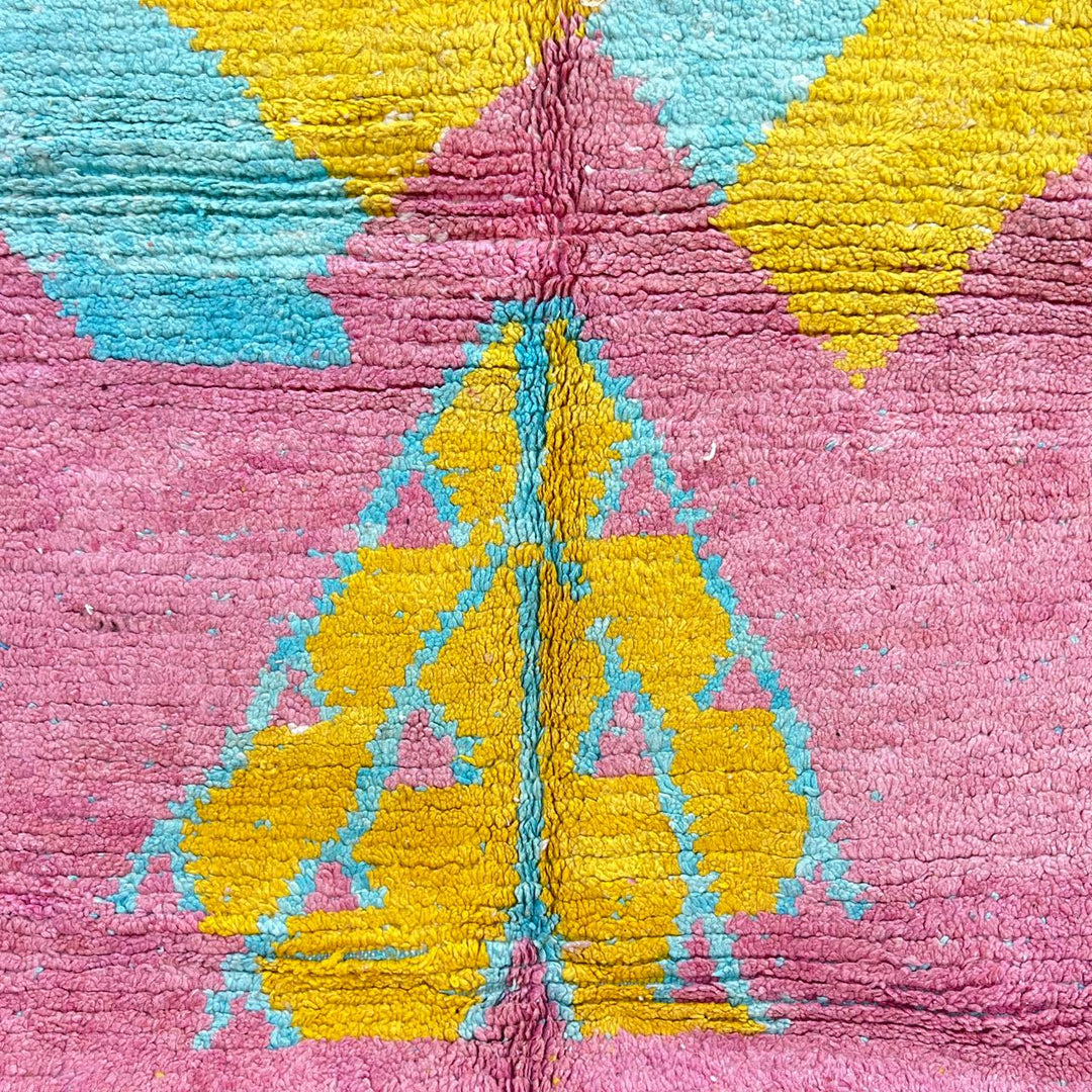 Vintage Moroccan wool rug 779 – handmade pink and yellow geometric Berber carpet with turquoise details, 325 × 167 cm (10.66 × 5.47 ft).