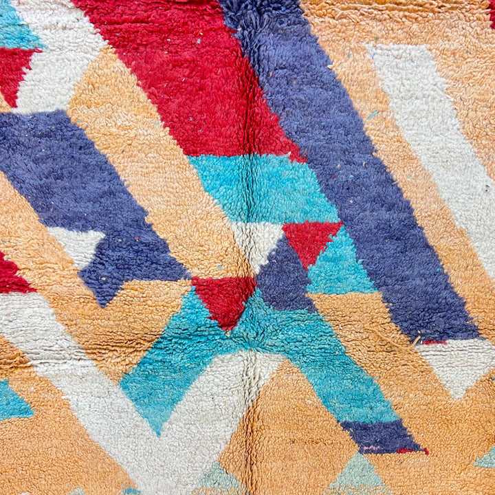 Vintage Moroccan wool rug 813 – handwoven Berber carpet featuring orange, red, turquoise and cream abstract patterns, 264 × 148 cm (8.66 × 4.85 ft).