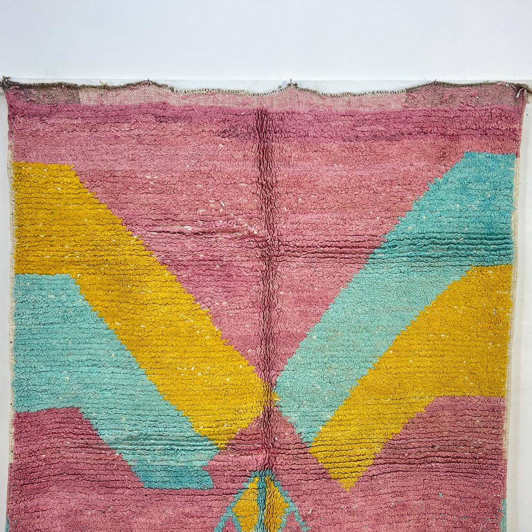 Vintage Moroccan wool rug 779 – handmade pink and yellow geometric Berber carpet with turquoise details, 325 × 167 cm (10.66 × 5.47 ft).