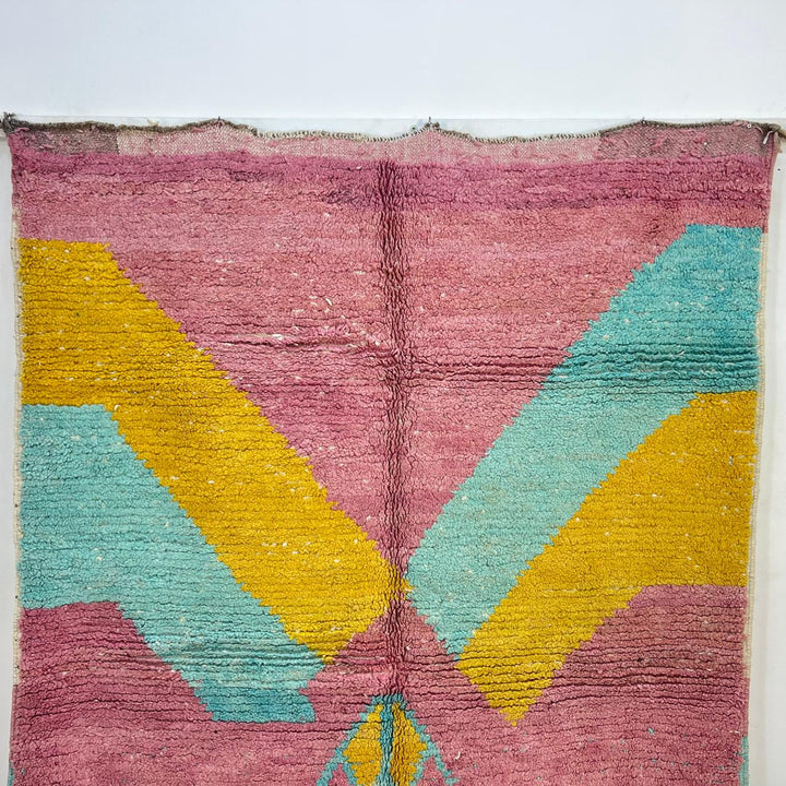 Vintage Moroccan wool rug 779 – handmade pink and yellow geometric Berber carpet with turquoise details, 325 × 167 cm (10.66 × 5.47 ft).