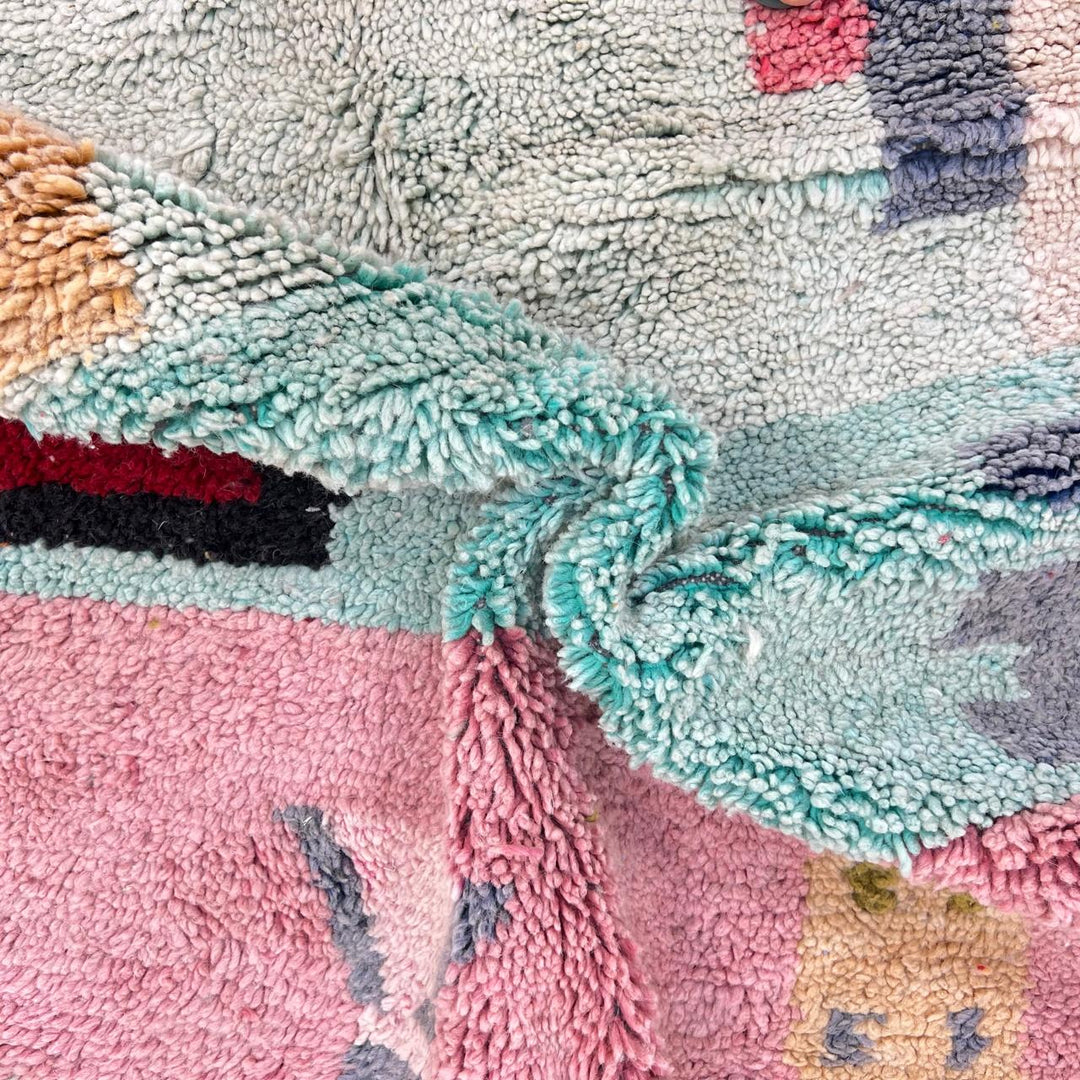 Vintage Moroccan wool rug 761 – handmade colorful Berber carpet with geometric abstract design in pink, turquoise, mustard, and beige tones, 260 × 151 cm.