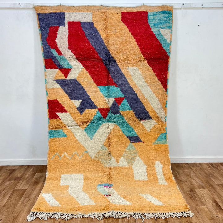 Vintage Moroccan wool rug 813 – handwoven Berber carpet featuring orange, red, turquoise and cream abstract patterns, 264 × 148 cm (8.66 × 4.85 ft).