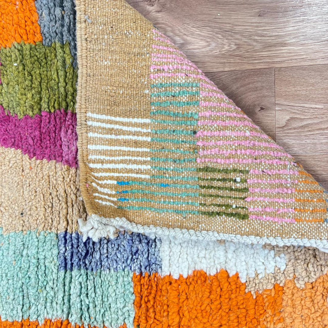 Vintage Moroccan wool runner 814 – handmade colorful Berber rug with abstract patchwork pattern in orange, pink, blue, and green, 409 × 80 cm (13.42 × 2.62 ft).