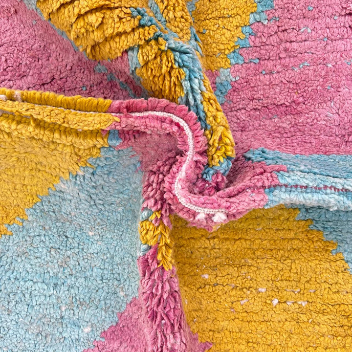 Vintage Moroccan wool rug 779 – handmade pink and yellow geometric Berber carpet with turquoise details, 325 × 167 cm (10.66 × 5.47 ft).