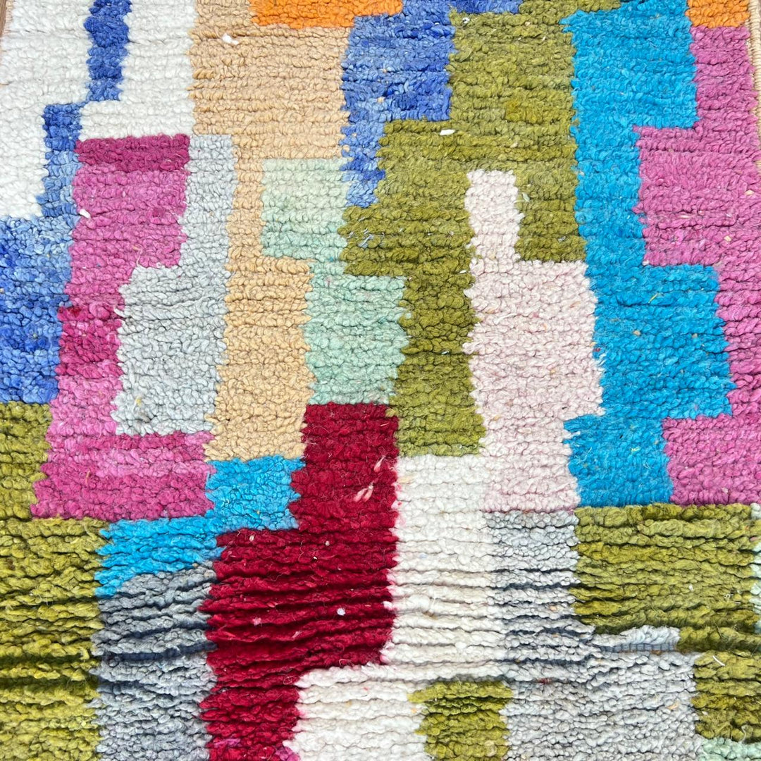 Vintage Moroccan wool runner 814 – handmade colorful Berber rug with abstract patchwork pattern in orange, pink, blue, and green, 409 × 80 cm (13.42 × 2.62 ft).