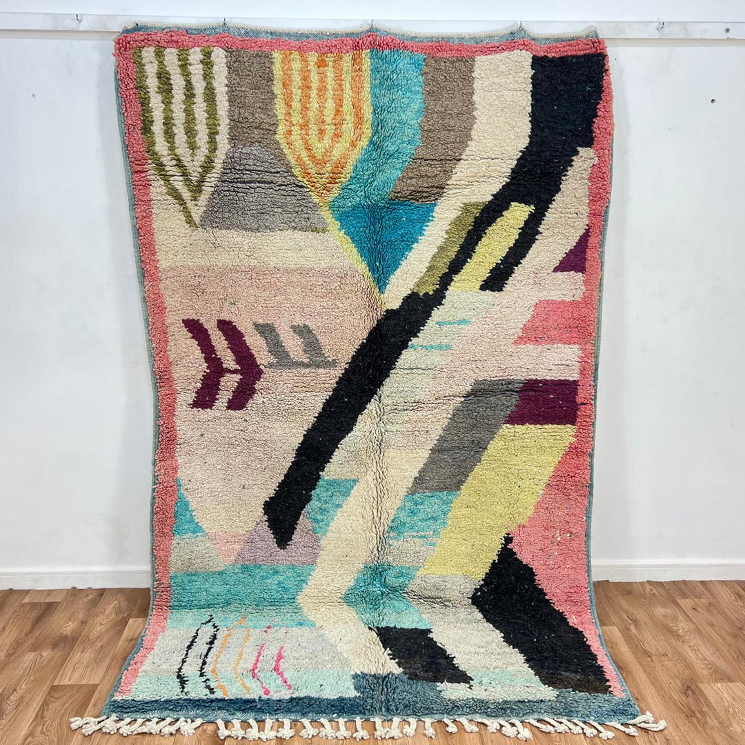 Vintage Moroccan wool rug 738 – handmade colorful geometric Berber carpet in turquoise, pink, yellow, and black 248 × 153 cm (8.13 × 5.02 ft).