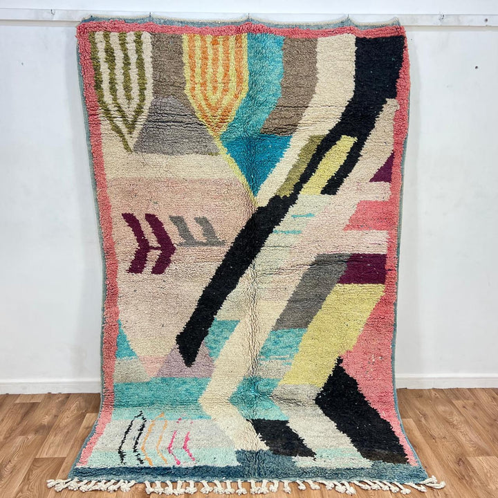Vintage Moroccan wool rug 738 – handmade colorful geometric Berber carpet in turquoise, pink, yellow, and black 248 × 153 cm (8.13 × 5.02 ft).