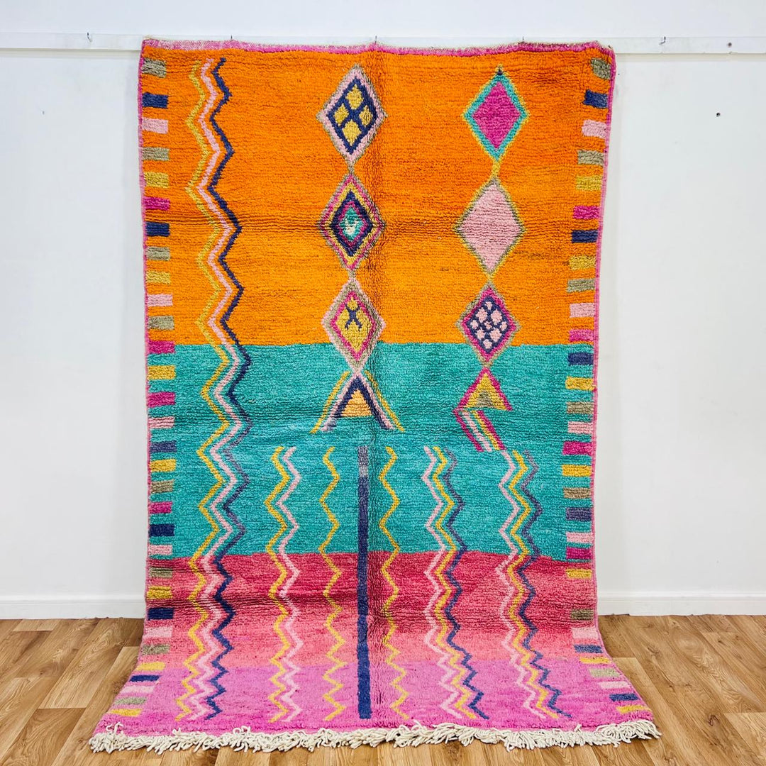 Vintage Moroccan rug with orange teal pink geometric Berber design handmade from natural wool