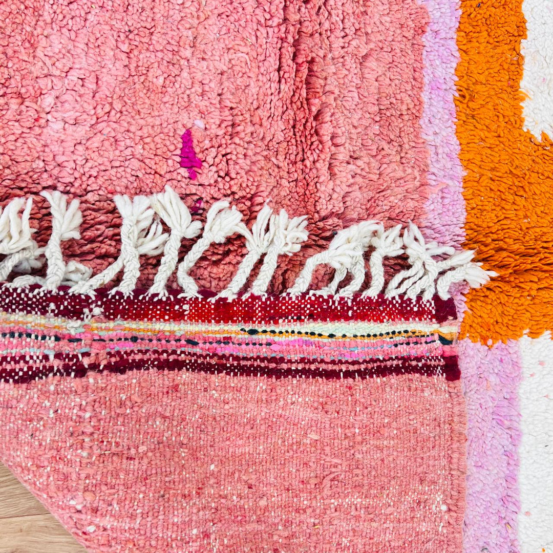Vintage Moroccan patchwork rug handmade from natural wool with colorful Berber squares