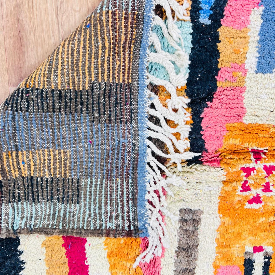 Vintage Moroccan rug handmade from colorful Berber wool with bold patchwork geometric design, 250x150 cm