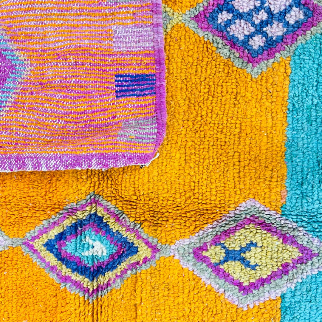 Vintage Moroccan rug with orange teal pink geometric Berber design handmade from natural wool
