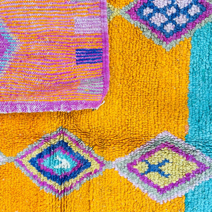 Vintage Moroccan rug with orange teal pink geometric Berber design handmade from natural wool