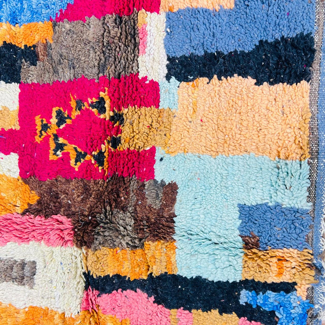 Vintage Moroccan rug handmade from colorful Berber wool with bold patchwork geometric design, 250x150 cm