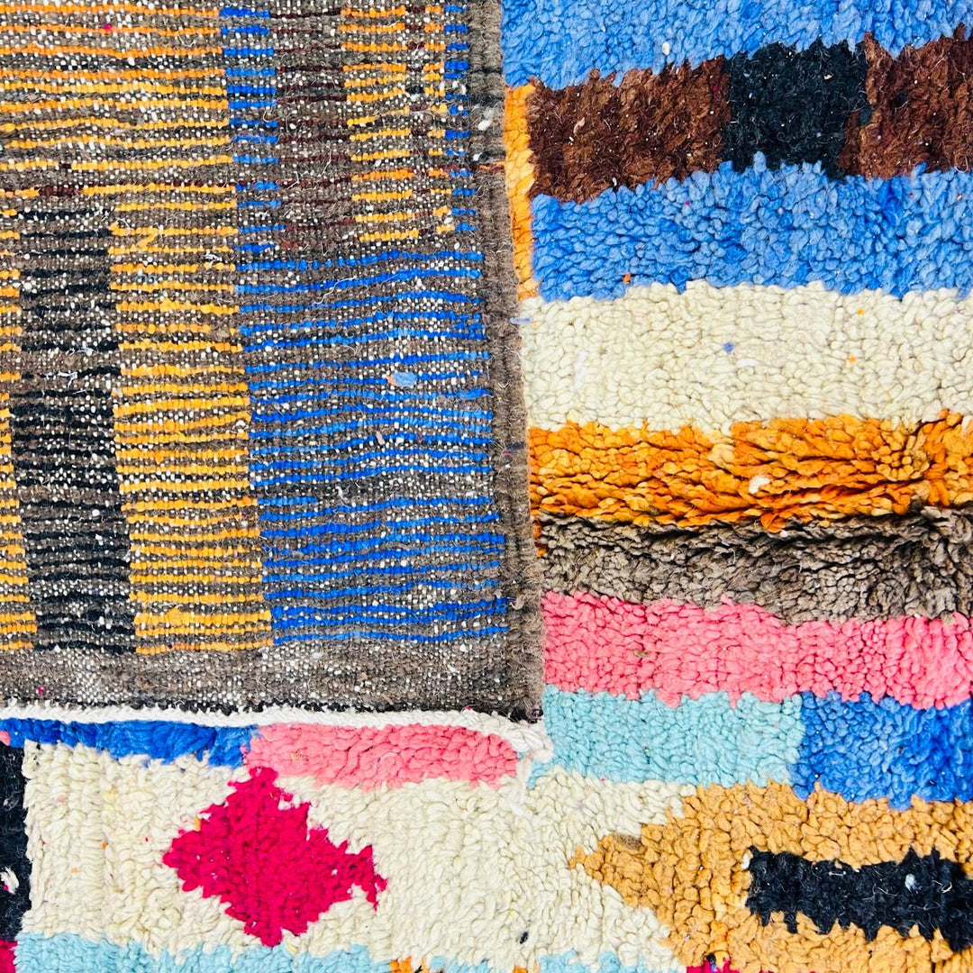 Vintage Moroccan rug handmade from colorful Berber wool with bold patchwork geometric design, 250x150 cm