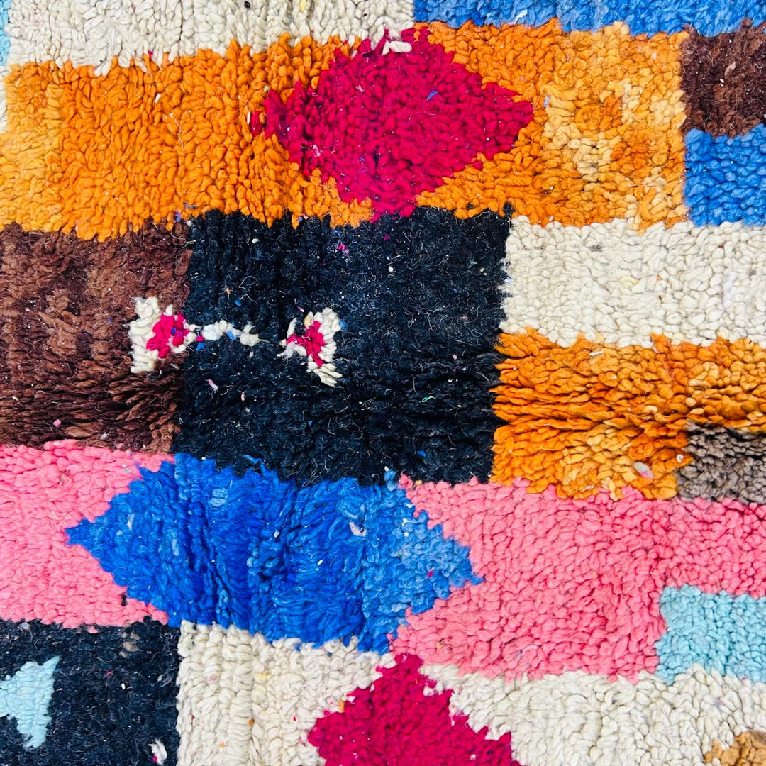 Vintage Moroccan rug handmade from colorful Berber wool with bold patchwork geometric design, 250x150 cm