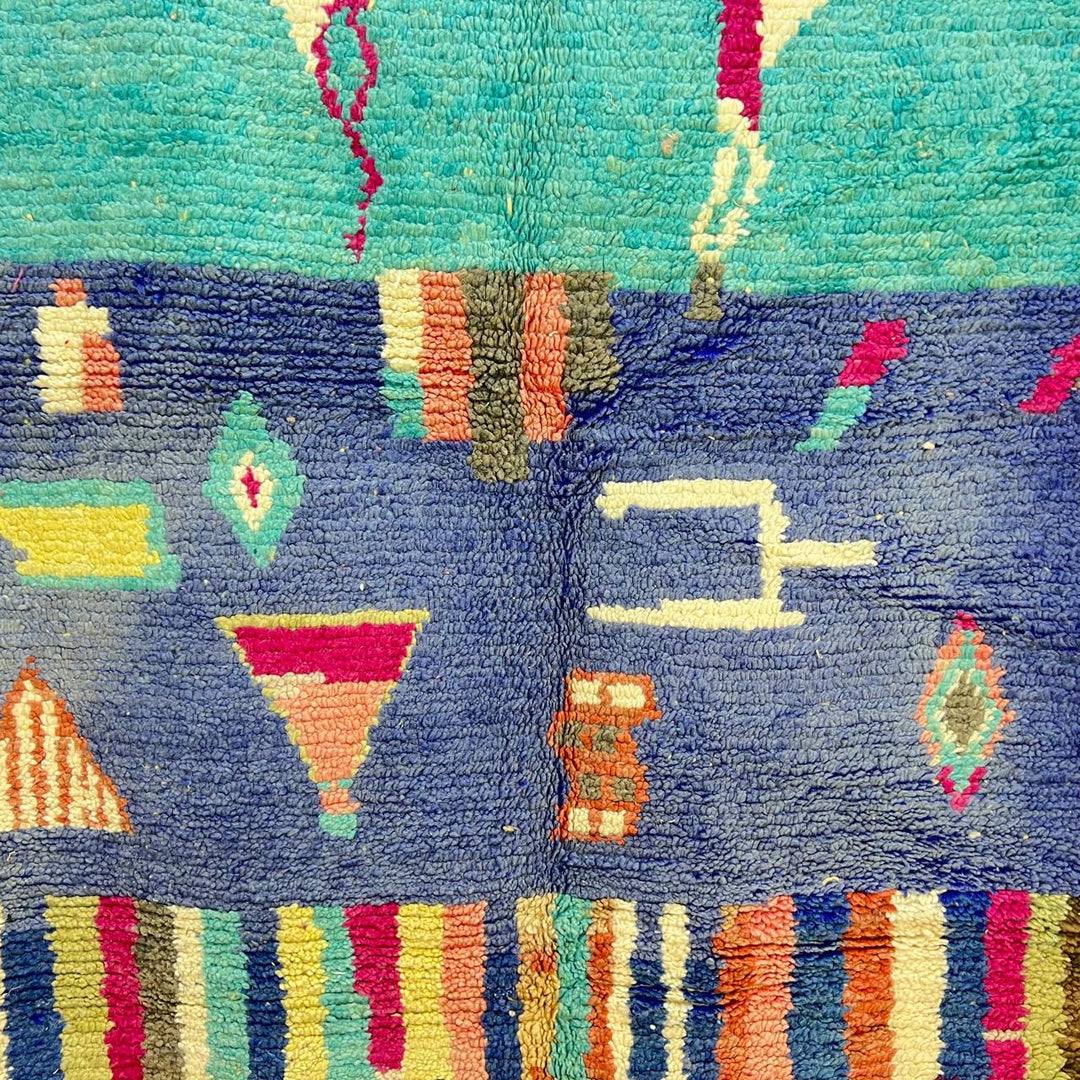 Vintage Moroccan wool rug 794 – handmade blue and multicolor Berber carpet with abstract tribal motifs 256 × 151 cm (8.39 × 4.95 ft).