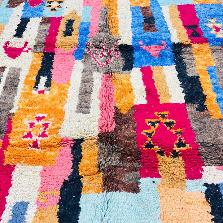 Vintage Moroccan rug handmade from colorful Berber wool with bold patchwork geometric design, 250x150 cm