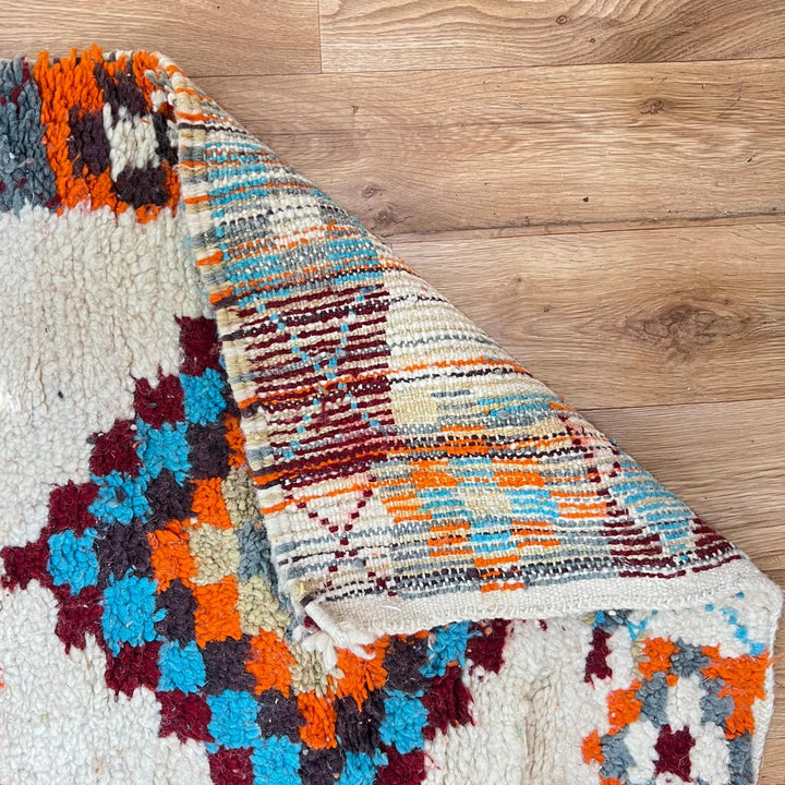 Vintage Moroccan runner rug with colorful Berber diamond patterns, handmade from natural wool, size 381 x 81 cm