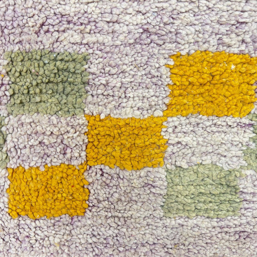 Vintage Moroccan wool rug with neutral base and colorful Berber geometric patterns