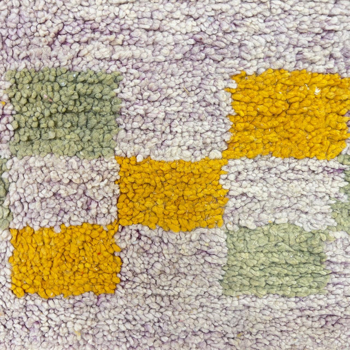 Vintage Moroccan wool rug with neutral base and colorful Berber geometric patterns