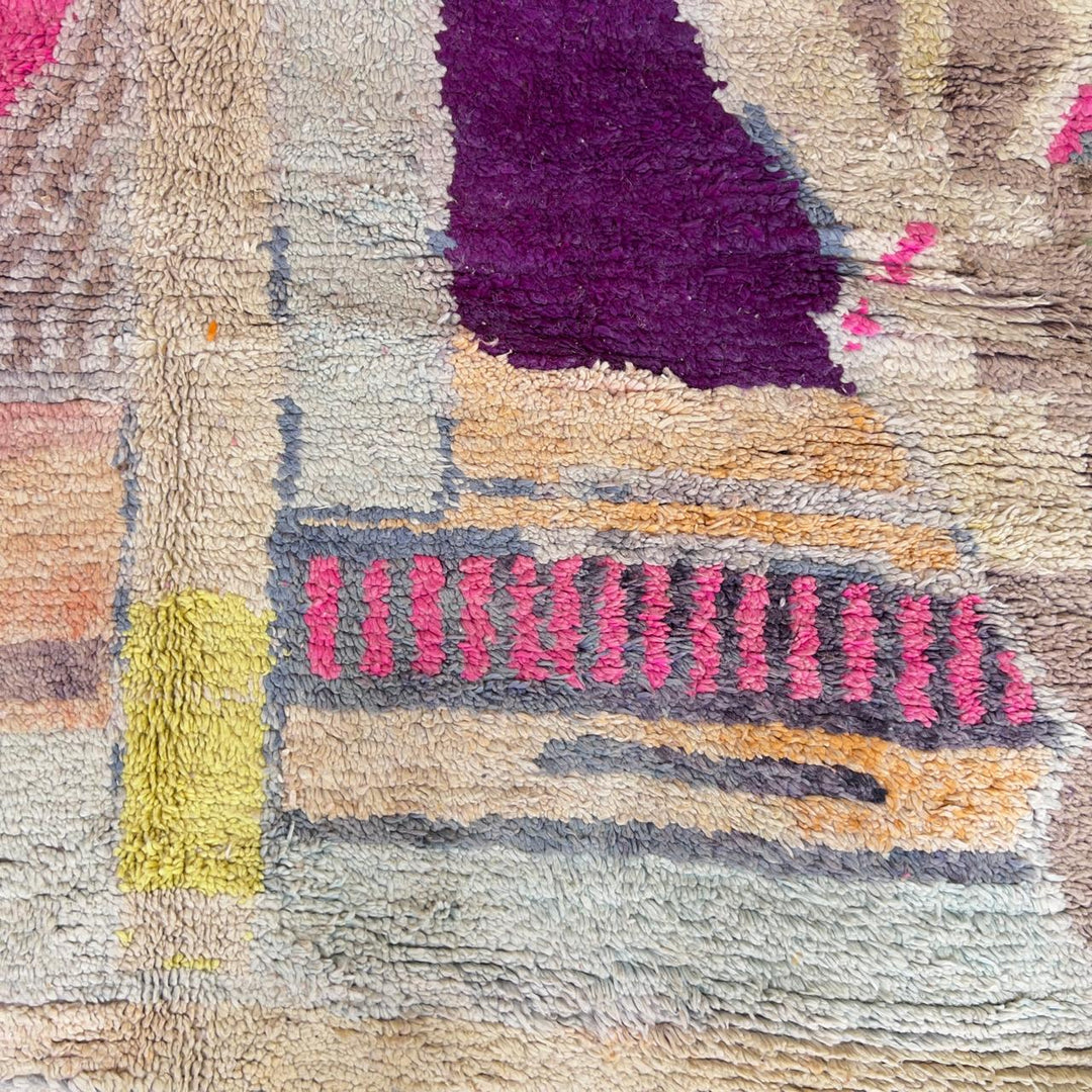 Large vintage Moroccan wool rug with abstract tribal symbols in beige, pink, and purple handmade Berber carpet