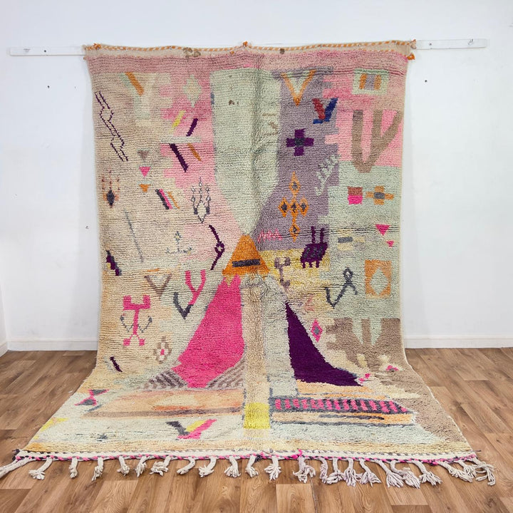 Large vintage Moroccan wool rug with abstract tribal symbols in beige, pink, and purple handmade Berber carpet
