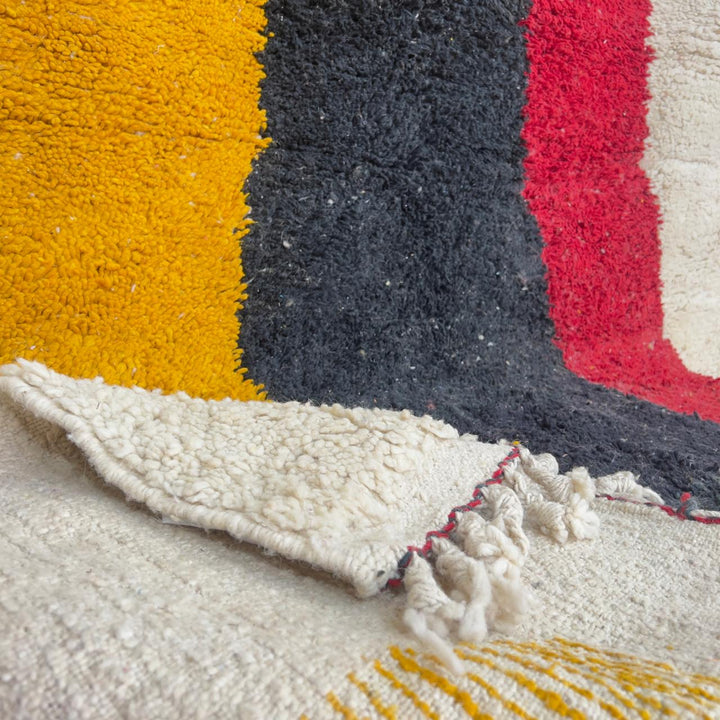 Vintage Moroccan wool rug minimalist ivory with red black yellow stripes