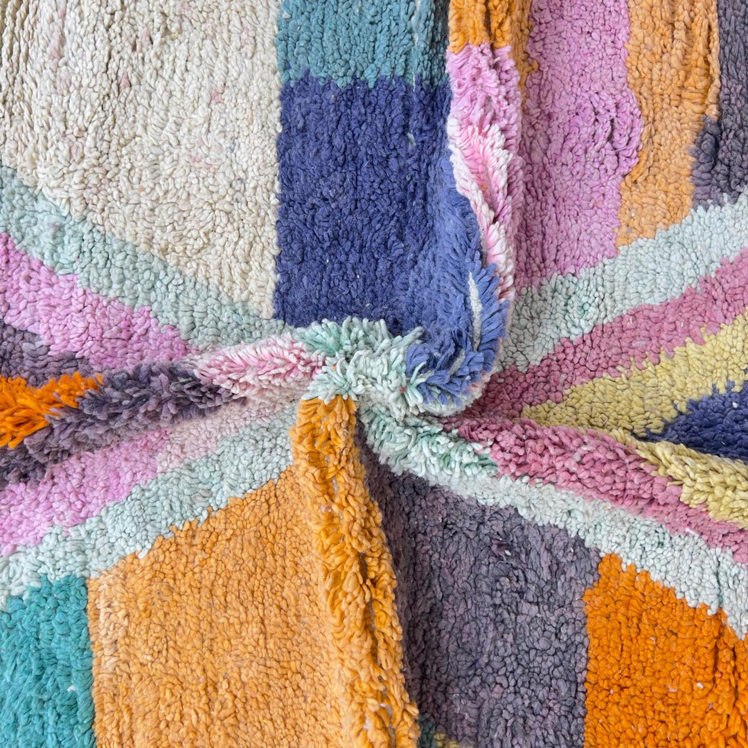 Vintage Moroccan wool rug with pastel geometric blocks and central diamond motif handmade Berber rug