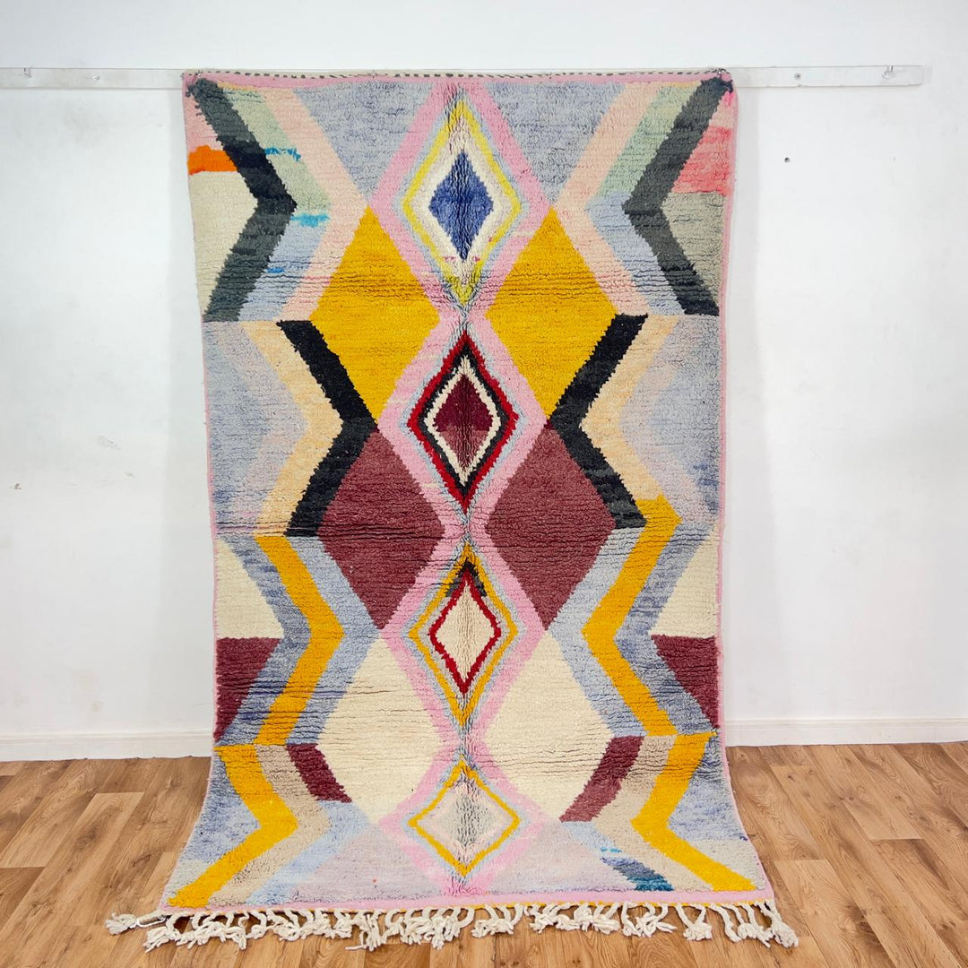Vintage Moroccan wool rug with diamond geometric pattern in yellow, pink and burgundy tones handmade Berber rug