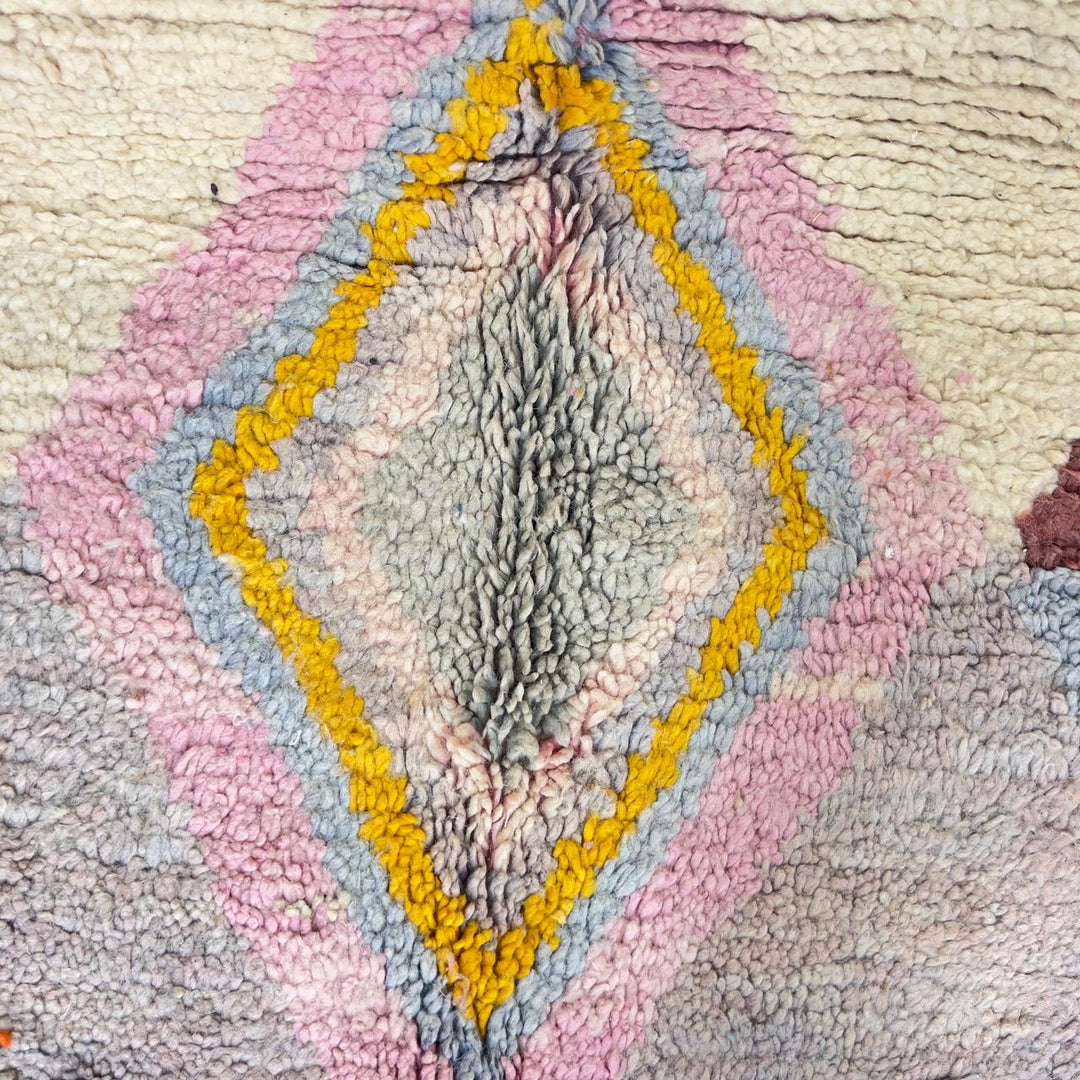 Vintage Moroccan wool rug with diamond geometric pattern in yellow, pink and burgundy tones handmade Berber rug