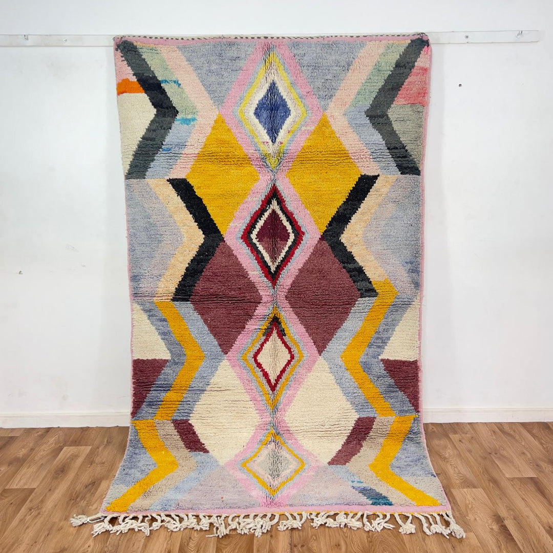 Vintage Moroccan wool rug with diamond geometric pattern in yellow, pink and burgundy tones handmade Berber rug
