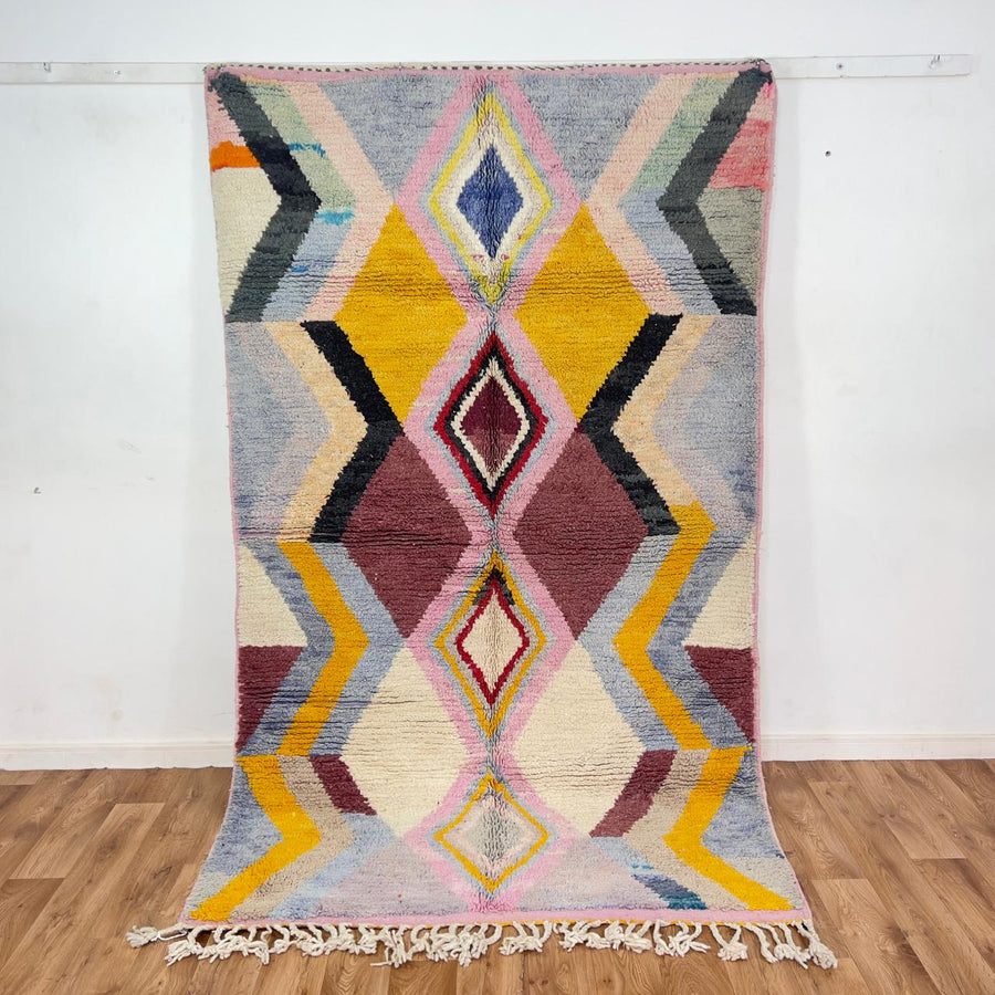 Vintage Moroccan wool rug with diamond geometric pattern in yellow, pink and burgundy tones handmade Berber rug