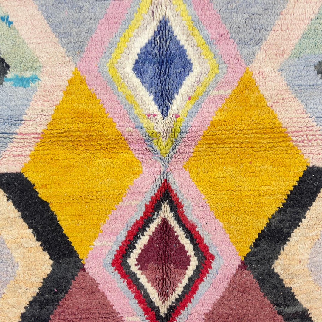 Vintage Moroccan wool rug with diamond geometric pattern in yellow, pink and burgundy tones handmade Berber rug