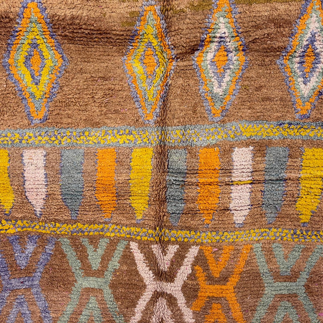 Vintage Moroccan wool rug with colorful Berber geometric patterns on brown background, handmade tribal carpet 8x5 ft