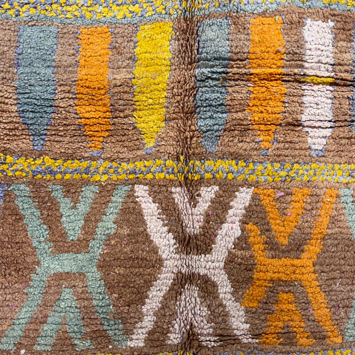 Vintage Moroccan wool rug with colorful Berber geometric patterns on brown background, handmade tribal carpet 8x5 ft