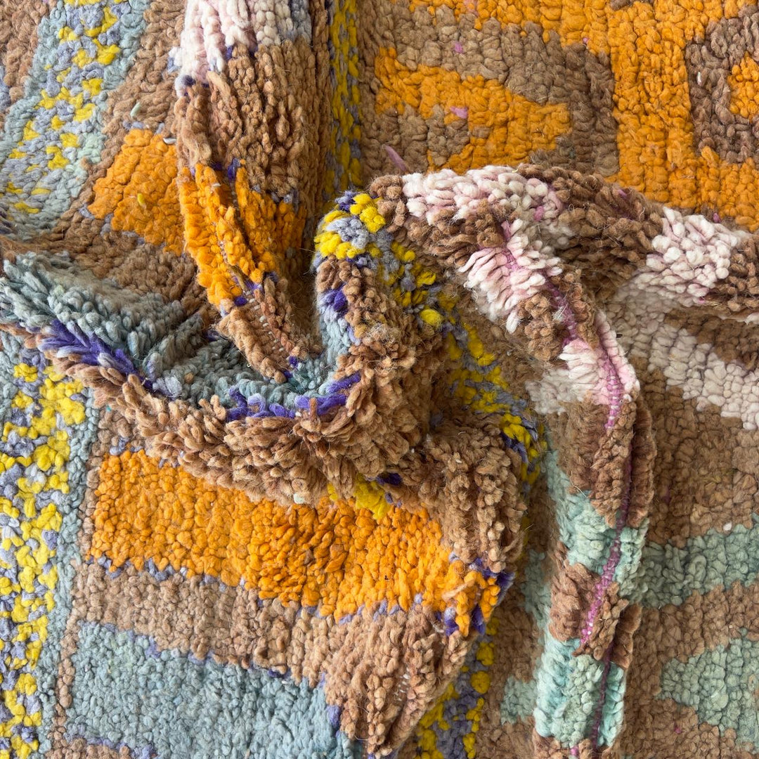 Vintage Moroccan wool rug with colorful Berber geometric patterns on brown background, handmade tribal carpet 8x5 ft