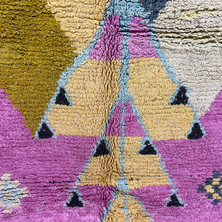 Vintage Moroccan wool rug in vibrant pink with geometric Berber patterns in mustard, beige, and charcoal, handmade shag rug