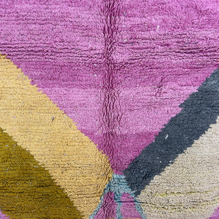 Vintage Moroccan wool rug in vibrant pink with geometric Berber patterns in mustard, beige, and charcoal, handmade shag rug