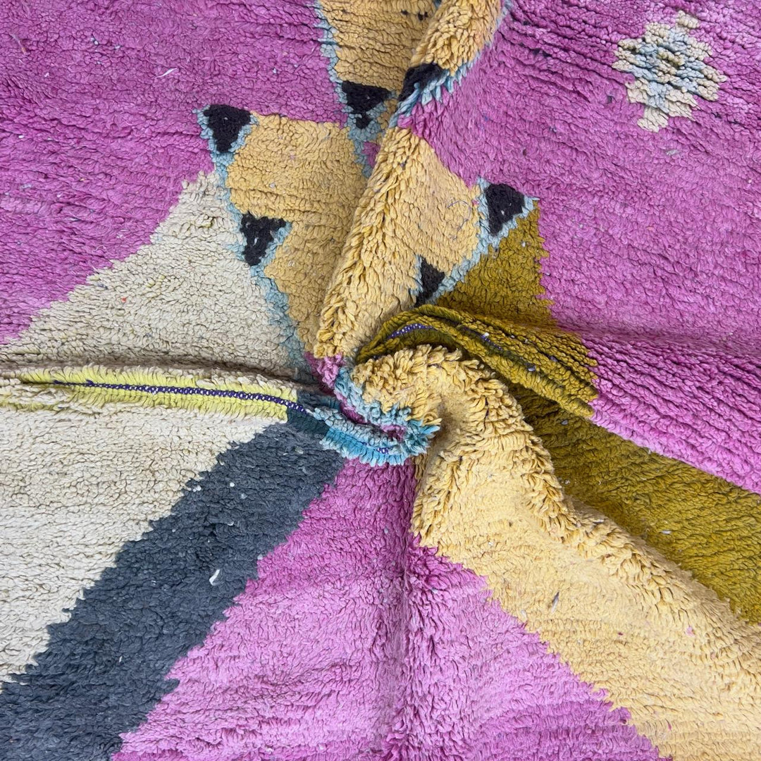 Vintage Moroccan wool rug in vibrant pink with geometric Berber patterns in mustard, beige, and charcoal, handmade shag rug
