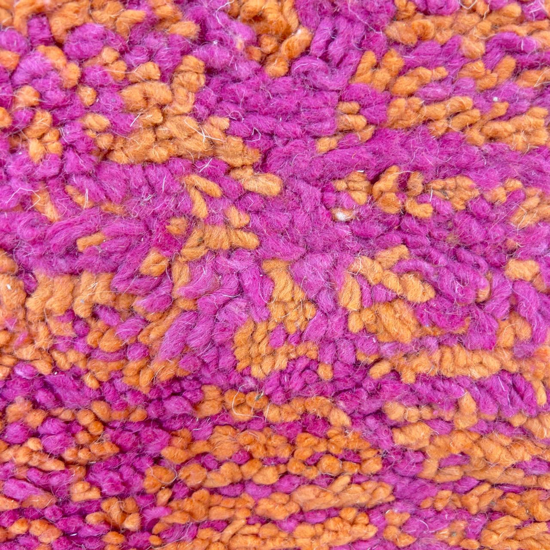Vintage Moroccan wool rug in orange and magenta with geometric tribal pattern handmade Berber rug
