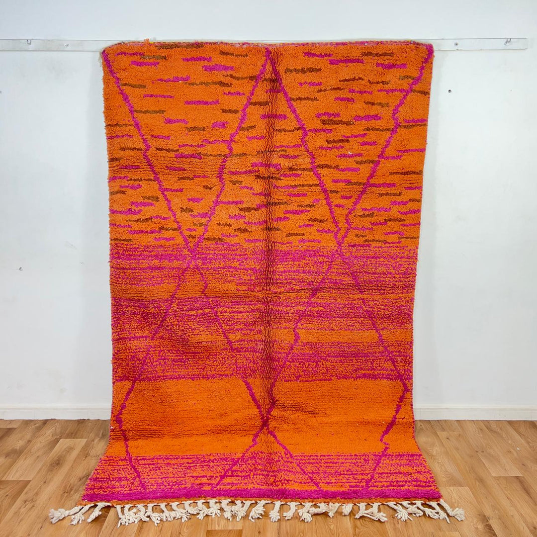 Vintage Moroccan wool rug in orange and magenta with geometric tribal pattern handmade Berber rug