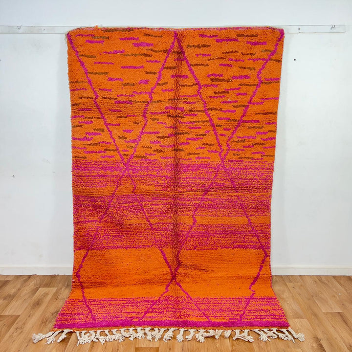 Vintage Moroccan wool rug in orange and magenta with geometric tribal pattern handmade Berber rug